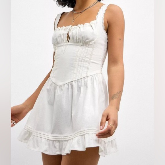 Urban Outfitters Dresses & Skirts - Urban Outfitters White corset tie Mini Dress with Lace Detail